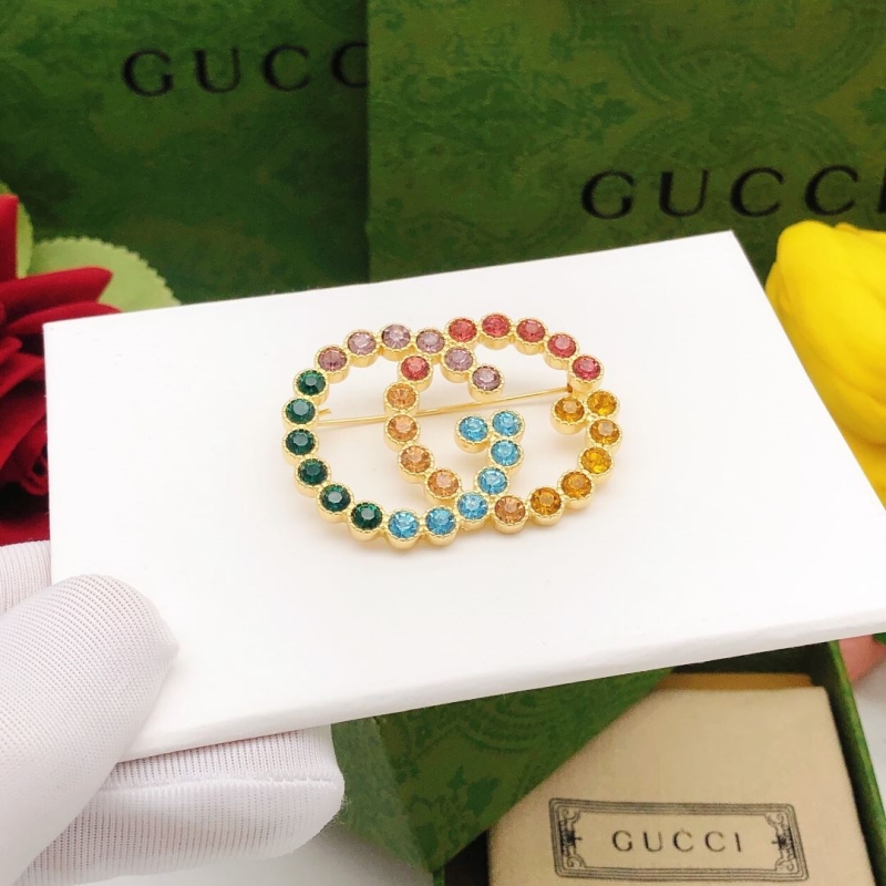 Gvc*1 brooches